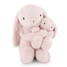 Two pink stuffed bunnies hugging.